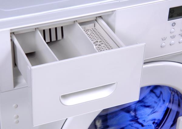 open detergent drawer in washing machine