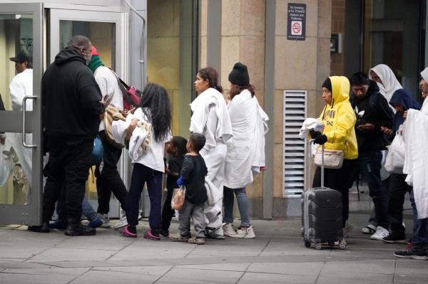 Migrants at the Trenton Transit Center.